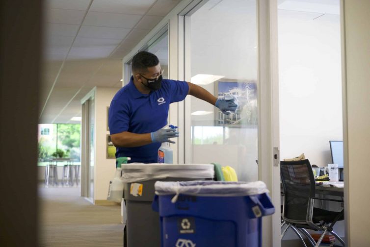 janitor wiping the glass